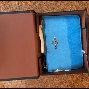 Never used Coach small wristlet